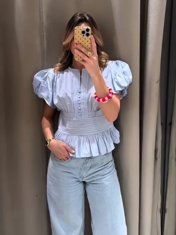 Женская летняя новая модная универсальная блузка с круглым вырезом, пышными рукавами и рюшами, элегантный плиссированный топ с коротким рукавом для женщин
Женская летняя новая модная универсальная блузка с круглым вырезом, пышными рукавами и рюшами, элегантный плиссированный топ с коротким рукавом для женщин