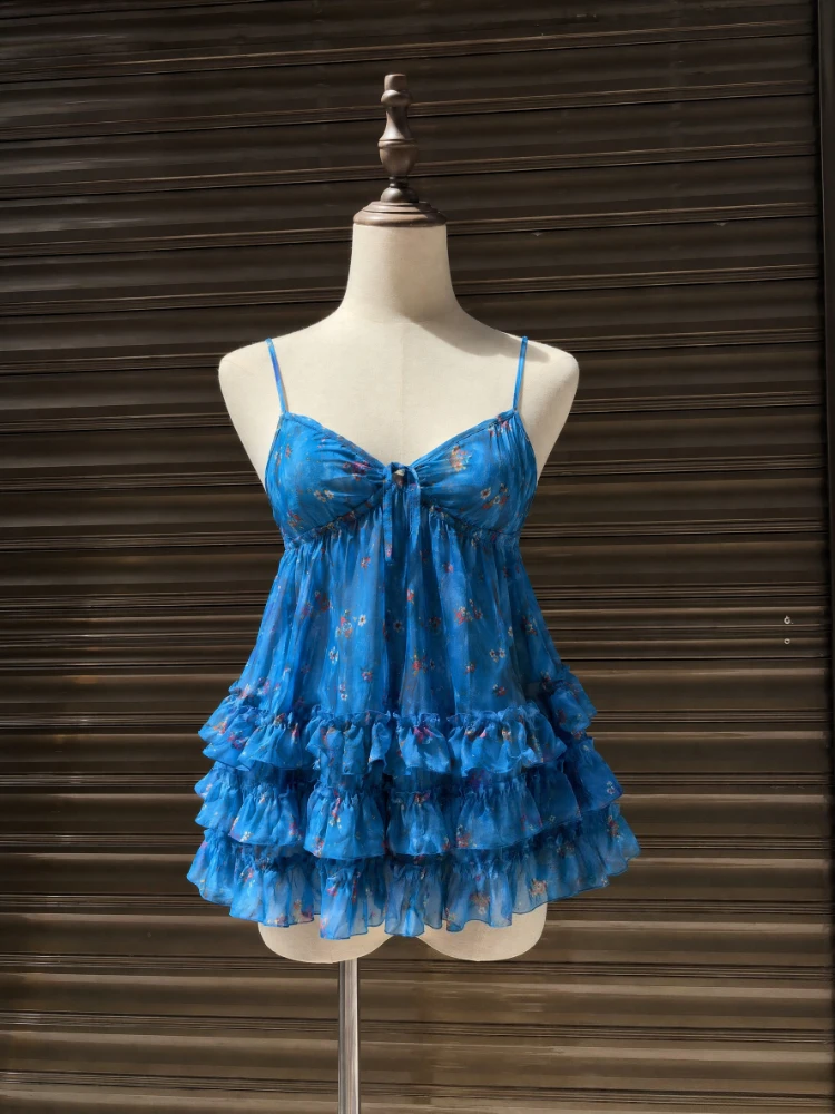 Blue Floral Spicy Girls V-neck Suspender Vest Women Wear French Sweet Summer Holiday Style Ruffled Sleeveless Tops Female New
Blue Floral Spicy Girls V-neck Suspender Vest Women Wear French Sweet Summer Holiday Style Ruffled Sleeveless Tops Female New