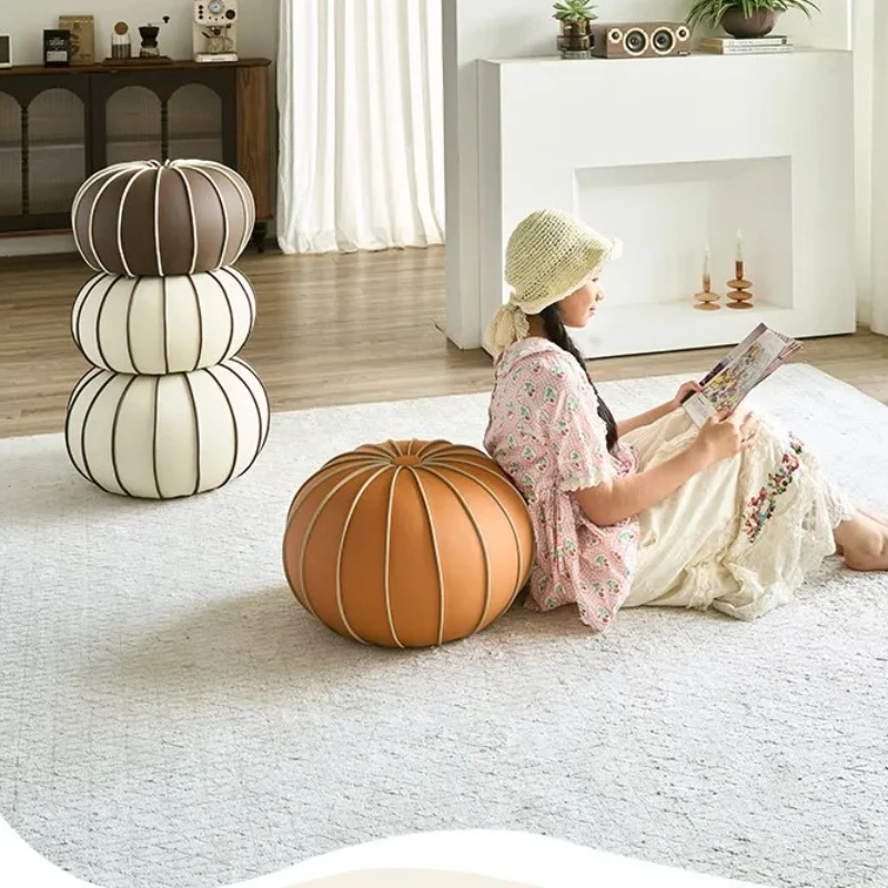 Light luxury leather small low household round small stool high sense living room sofa coffee
Light luxury leather small low household round small stool high sense living room sofa coffee