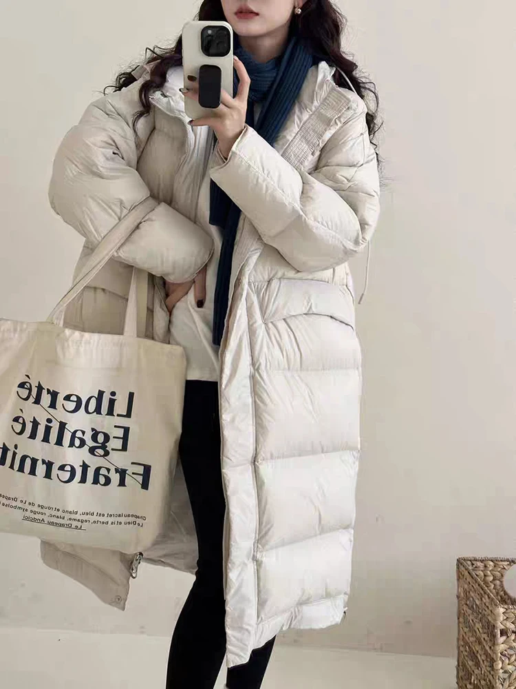 Зимний длинный пуховик с капюшоном на шнурке, женские куртки до колена на белом утином пуху, женская толстая теплая водонепроницаемая верхняя одежда
Зимний длинный пуховик с капюшоном на шнурке, женские куртки до колена на белом утином пуху, женская толстая теплая водонепроницаемая верхняя одежда