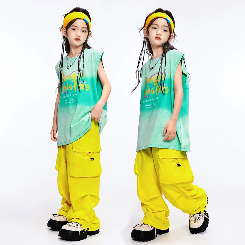 Одежда в стиле хип-хоп для девочек, укороченный жилет ярких цветов, брюки-карго, детская майка с капюшоном для уличных танцев, детская уличная одежда, комплекты одежды для джаза
Одежда в стиле хип-хоп для девочек, укороченный жилет ярких цветов, брюки-карго, детская майка с капюшоном для уличных танцев, детская уличная одежда, комплекты одежды для джаза