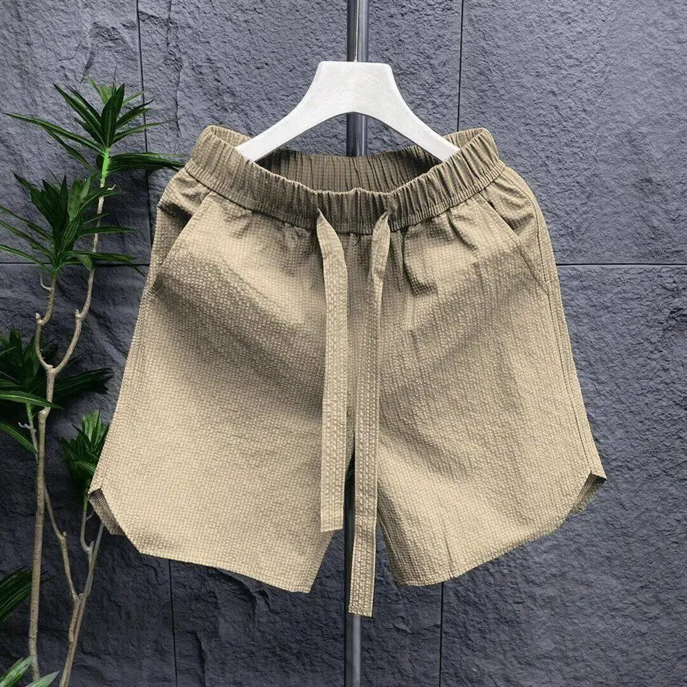 Quick Dry Bubble Cloth Shorts Men's Summer Thin Casual Loose Running Sports Beach Five-Quarter Mid-Pants Elastic Waist Band
Quick Dry Bubble Cloth Shorts Men's Summer Thin Casual Loose Running Sports Beach Five-Quarter Mid-Pants Elastic Waist Band