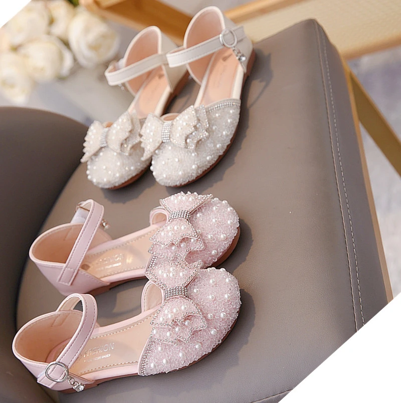 Лидер продаж, элегантные и легкие детские сандалии на плоской подошве Baotou, летняя модная мягкая/удобная повседневная обувь принцессы с жемчугом 
Лидер продаж, элегантные и легкие детские сандалии на плоской подошве Baotou, летняя модная мягкая/удобная повседневная обувь принцессы с жемчугом