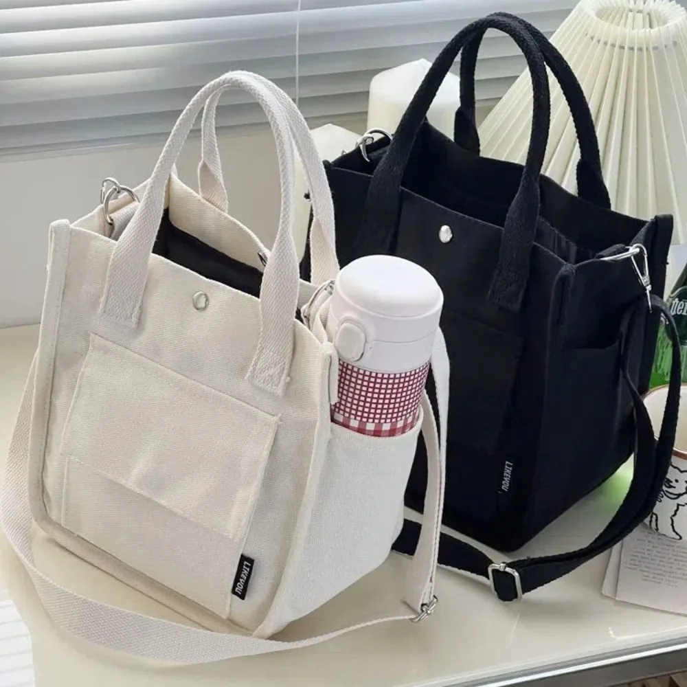 Портативная большая сумка с несколькими карманами, большая вместительная сумка через плечо с минималистичным дизайном, парусиновая многофункциональная сумка на плечо, женская 
Портативная большая сумка с несколькими карманами, большая вместительная сумка через плечо с минималистичным дизайном, парусиновая многофункциональная сумка на плечо, женская