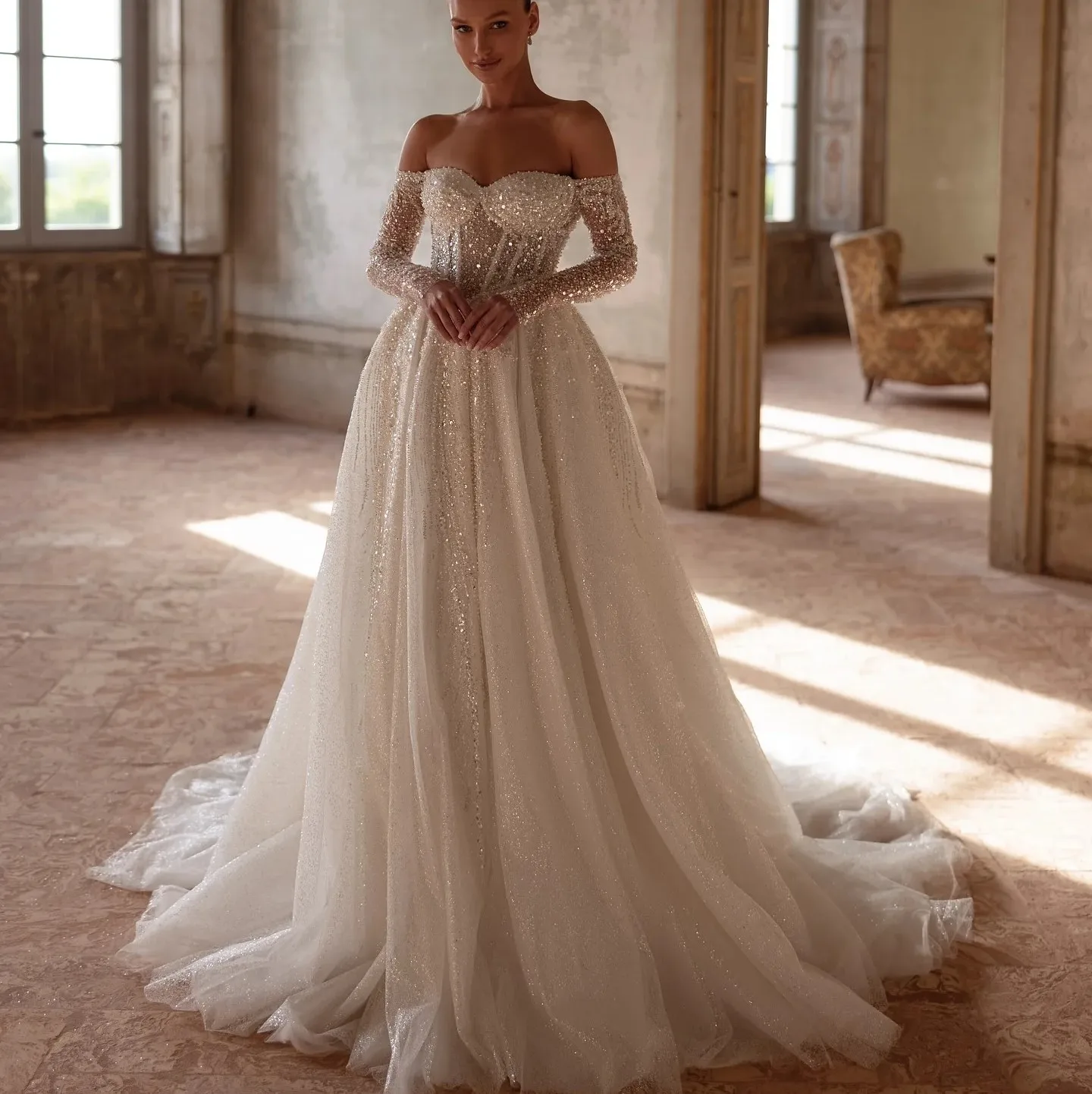 Luxury Sequins Church Wedding Dress 2026 Off the Shoulder Beads Backless A-line Bridal Bride Gown Vestidos De Noiva
Luxury Sequins Church Wedding Dress 2026 Off the Shoulder Beads Backless A-line Bridal Bride Gown Vestidos De Noiva