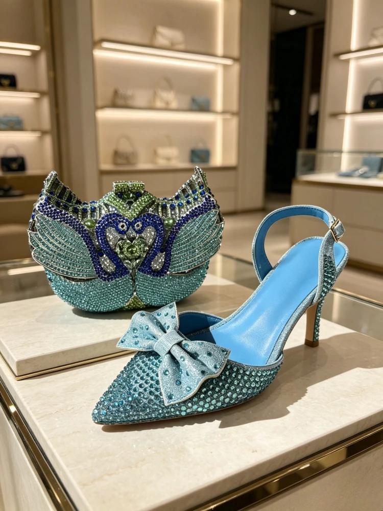 2026Light Blue Glitter Bow Pointed Slingback Heels & Double Swan Shaped Crystal Clutch Bag Set Luxury Women Runway Fashion Shoes
2026Light Blue Glitter Bow Pointed Slingback Heels & Double Swan Shaped Crystal Clutch Bag Set Luxury Women Runway Fashion Shoes