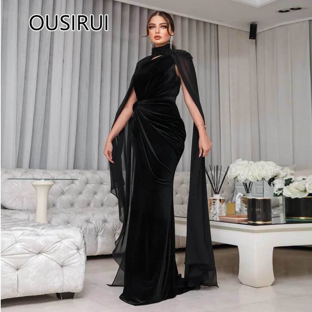 Dazzling High-Neck Velet Pleated Bridal Saudi Gown Mermaid Floor-Length Court Beaded Crystal Evening Gown with Cape Custom Made
Dazzling High-Neck Velet Pleated Bridal Saudi Gown Mermaid Floor-Length Court Beaded Crystal Evening Gown with Cape Custom Made