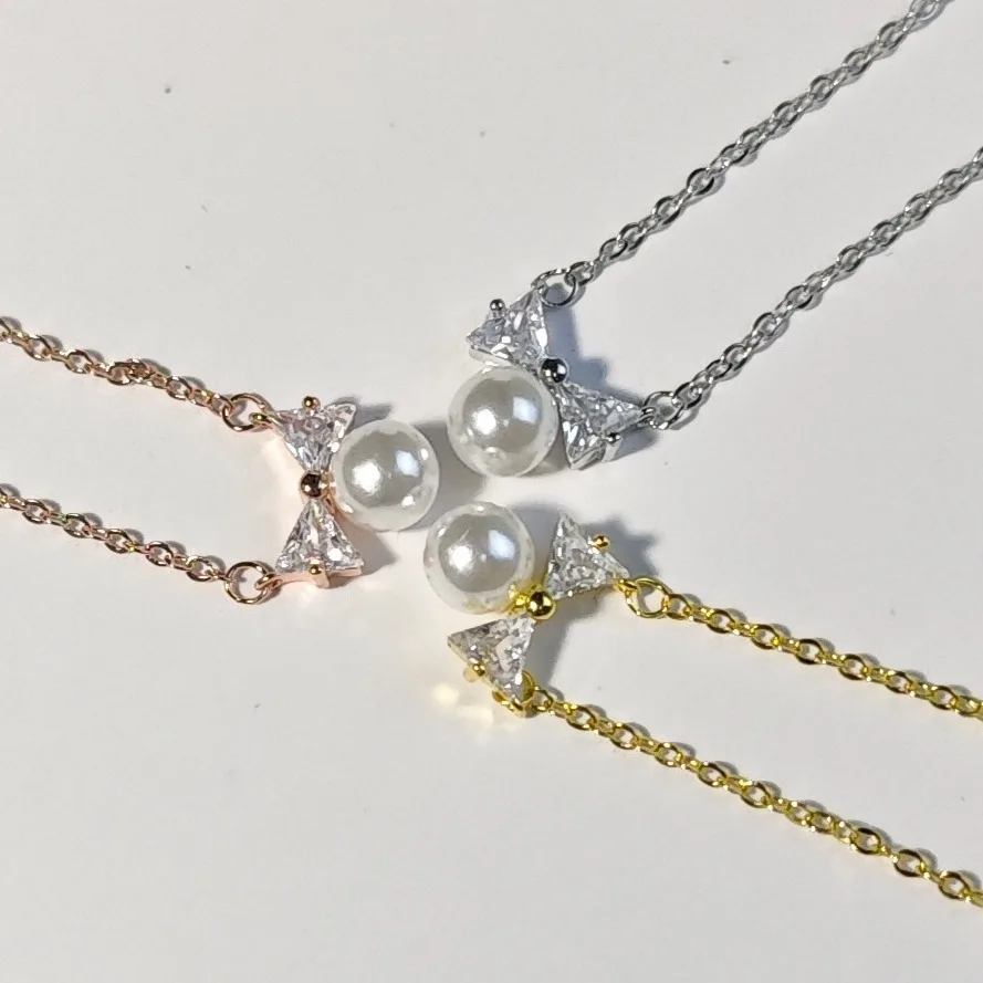 Уникальный дизайн, жемчужное ожерелье с бантом, женское нишевое высококачественное темпераментное простое и милое ожерелье-цепочка на ключицы
Уникальный дизайн, жемчужное ожерелье с бантом, женское нишевое высококачественное темпераментное простое и милое ожерелье-цепочка на ключицы