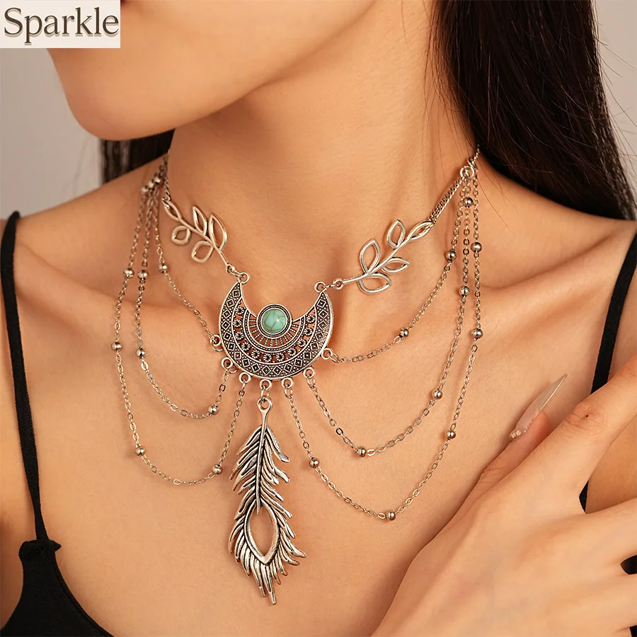 Vintage Turquoise Leaf Moon Feather Tassel Necklace for Women Fashionable Unique Choker Boho Vibe Neck Ornament Luxury Jewelry
Vintage Turquoise Leaf Moon Feather Tassel Necklace for Women Fashionable Unique Choker Boho Vibe Neck Ornament Luxury Jewelry