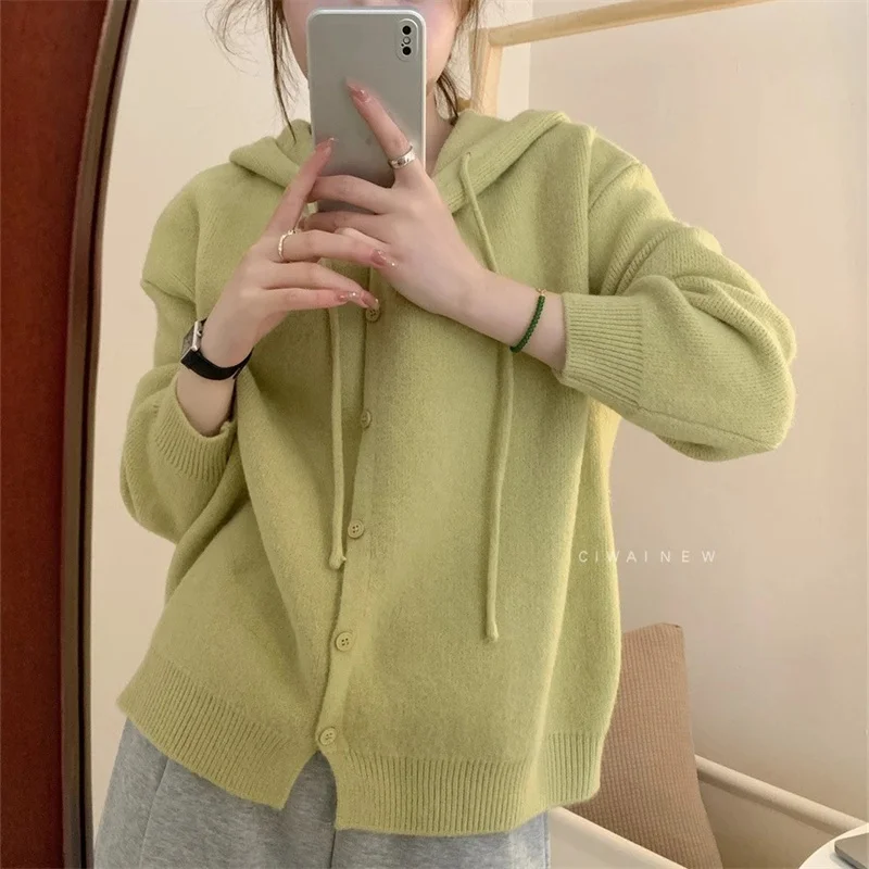 Korean Female Solid Soft Knitted Cardigan Jacket Autumn New Women Loose Casual Sweater Coat Simple Wild Hooded Cardigan Sweater
Korean Female Solid Soft Knitted Cardigan Jacket Autumn New Women Loose Casual Sweater Coat Simple Wild Hooded Cardigan Sweater