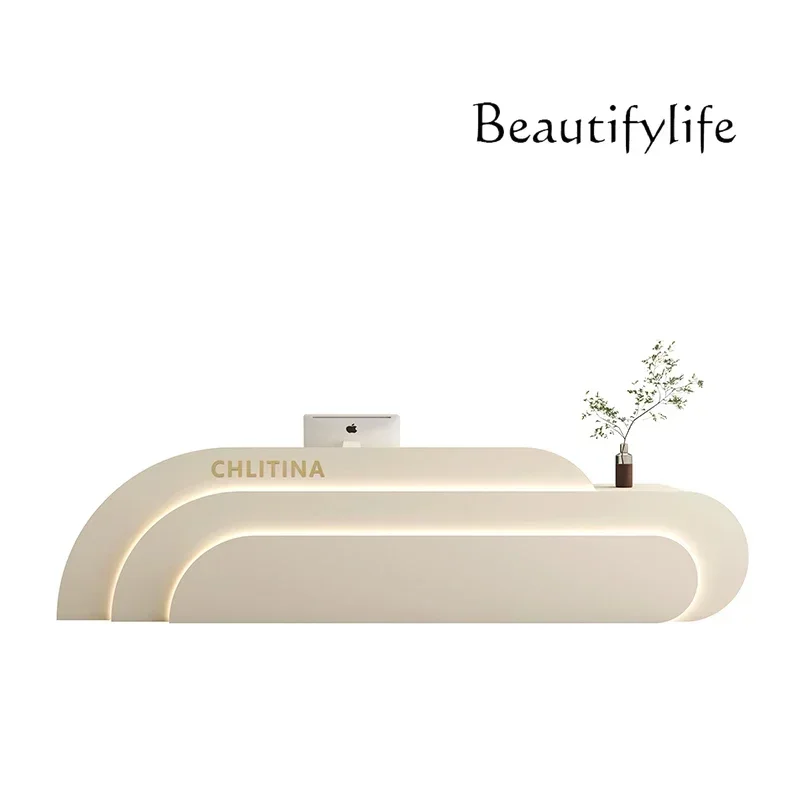 Nordic cream style beauty salon bar counter curved simple reception front deskescritorio de oficina
Nordic cream style beauty salon bar counter curved simple reception front deskescritorio de oficina