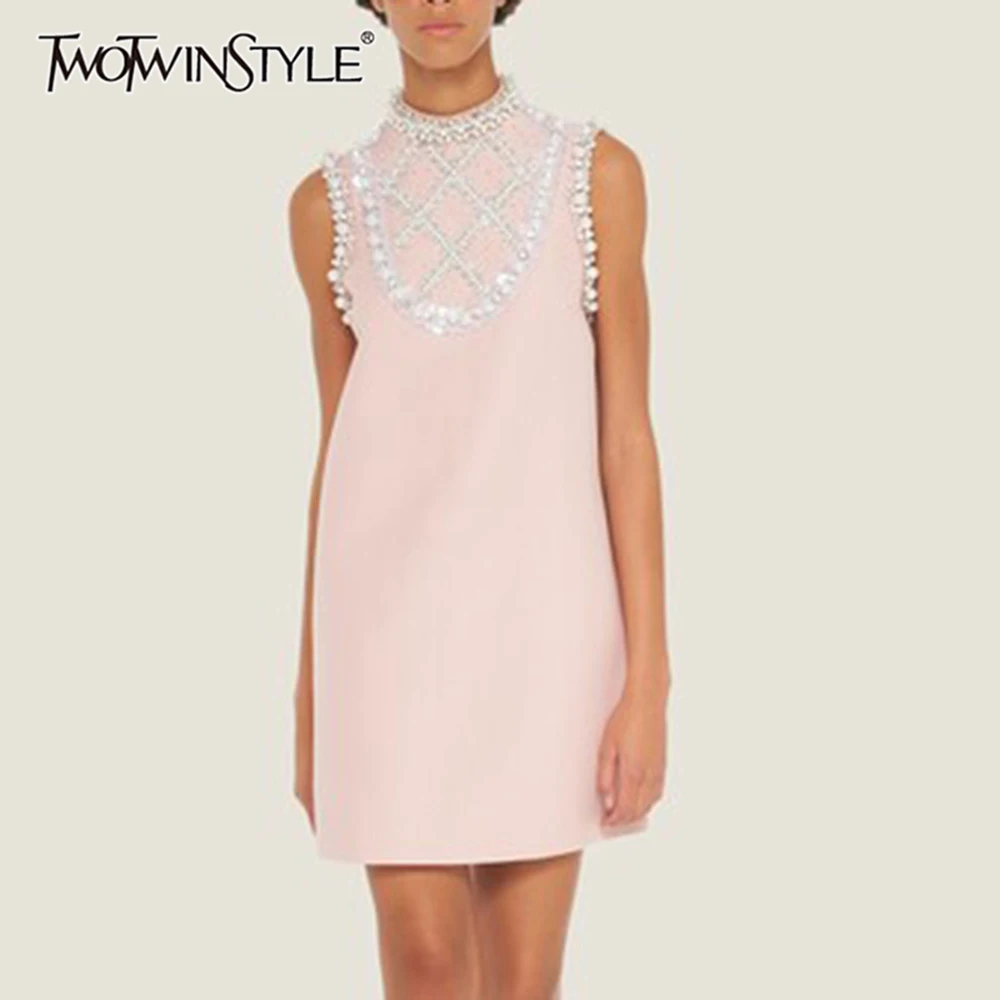 TWOTWINSTYLE Solid Spliced Bead Elegant Mini Dresses for Women Round Neck Sleeveless Temperament Dress Female Fashion Clothing
TWOTWINSTYLE Solid Spliced Bead Elegant Mini Dresses for Women Round Neck Sleeveless Temperament Dress Female Fashion Clothing