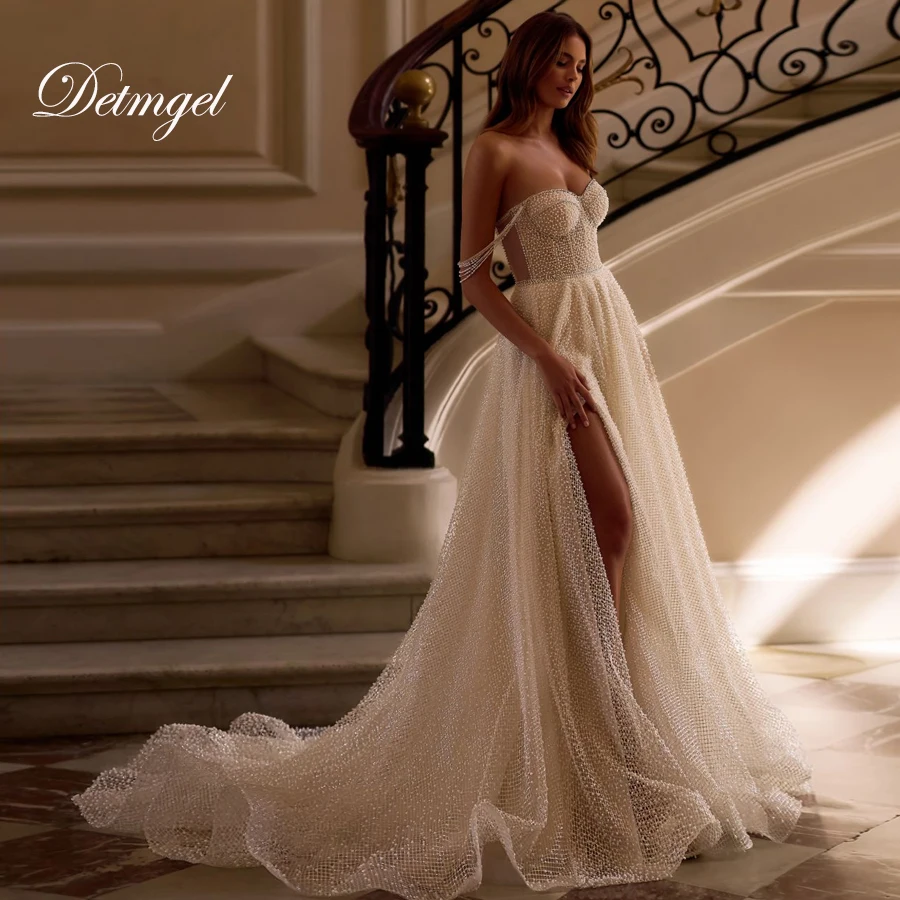 Detmgel Новые современные свадебные платья трапециевидной формы без бретелек с открытой спиной и аппликациями из бисера, сетчатое свадебное платье со шлейфом по индивидуальному заказу 
Detmgel Новые современные свадебные платья трапециевидной формы без бретелек с открытой спиной и аппликациями из бисера, сетчатое свадебное платье со шлейфом по индивидуальному заказу