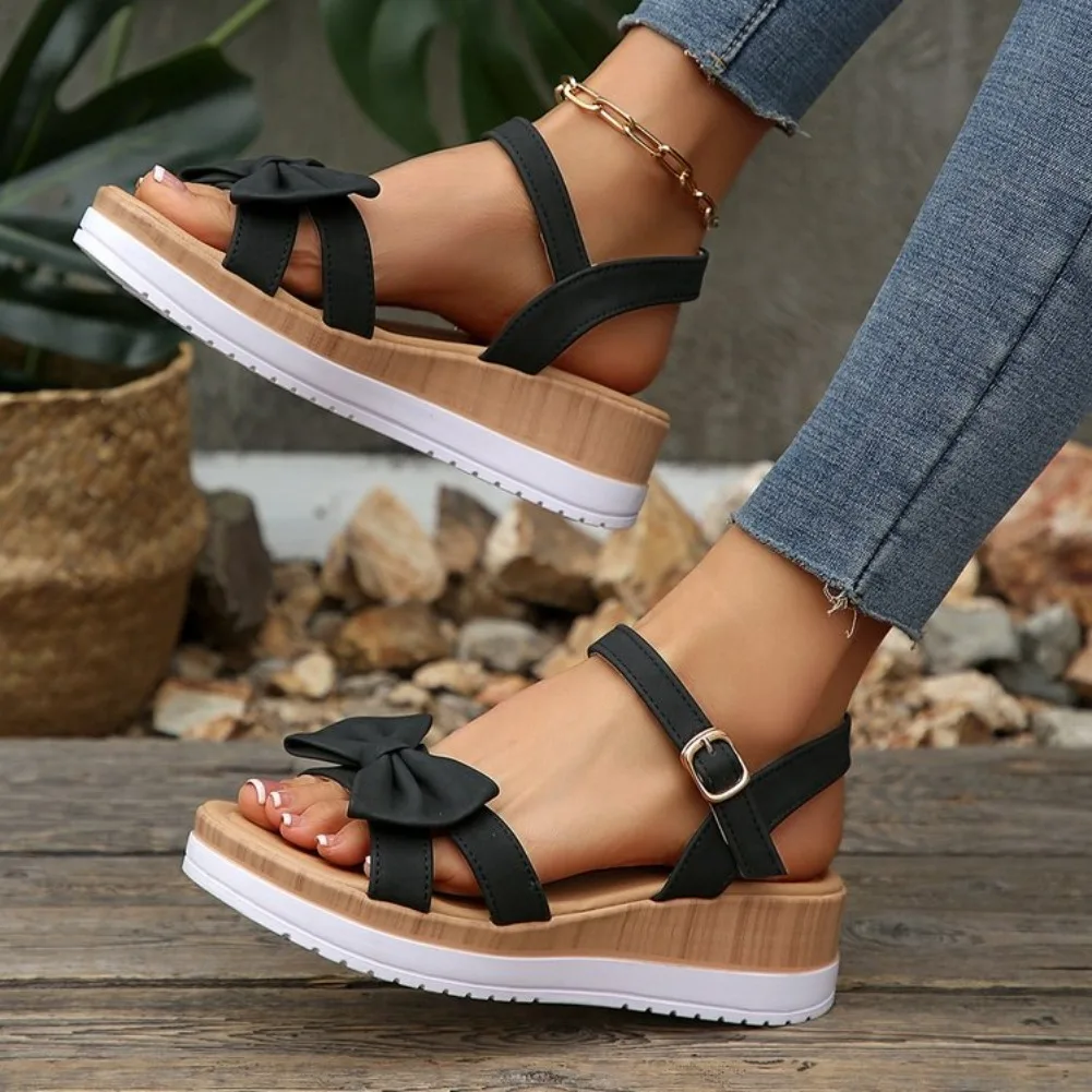 2026 New Women's Buckle Sandals Summer Comfortable Lightweight Fashion Beach Casual Shoes Bow Wedge Sandals Sizes 36-43
2026 New Women's Buckle Sandals Summer Comfortable Lightweight Fashion Beach Casual Shoes Bow Wedge Sandals Sizes 36-43