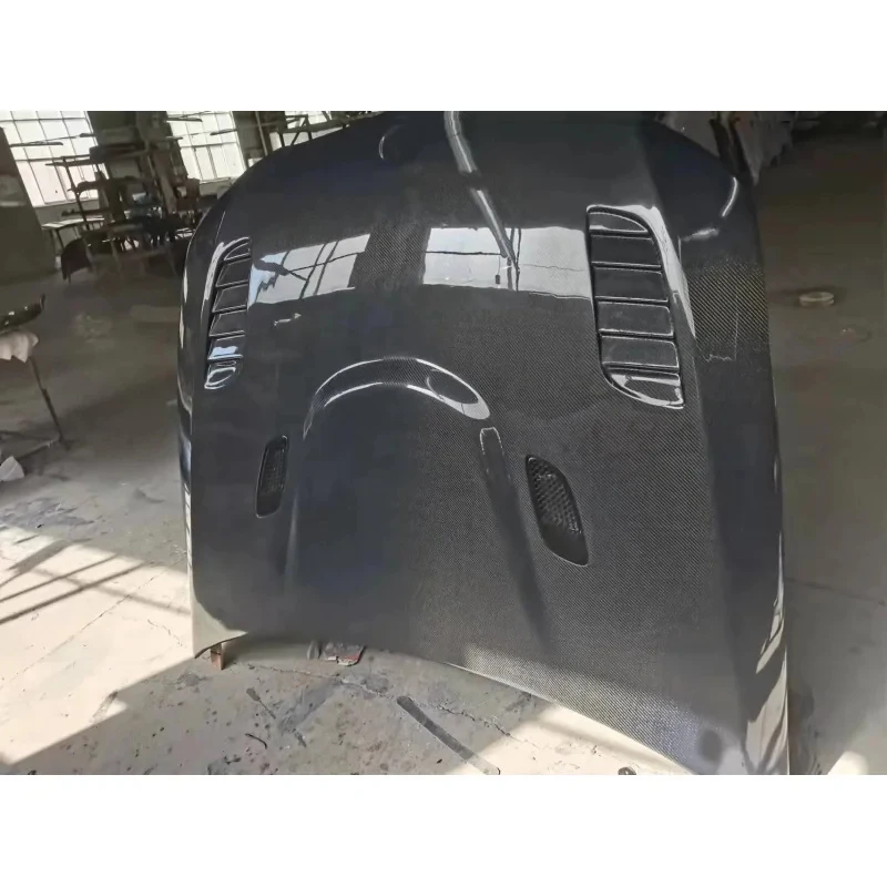 Carbon Fiber Hood with Vents Fit E90 3 Series 2004-2011 V Style OEM Fit
Carbon Fiber Hood with Vents Fit E90 3 Series 2004-2011 V Style OEM Fit