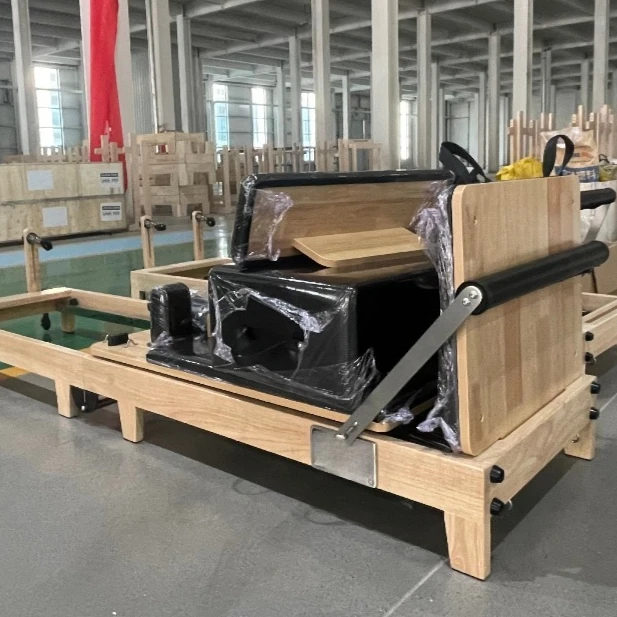 Хит продаж: Экономичный, прочный, регулируемый пилатес-реформер из массива дерева для студий йоги и домашнего использования, для коррекции фигуры
Хит продаж: Экономичный, прочный, регулируемый пилатес-реформер из массива дерева для студий йоги и домашнего использования, для коррекции фигуры