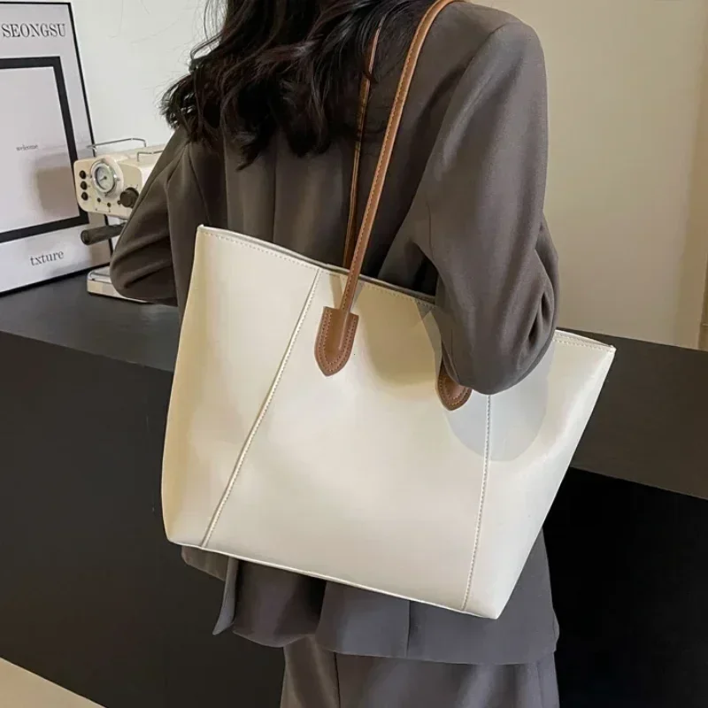 Luxury PU Leather Women's Shoulder Bag Stitched Designer Tote Handbag with Metal Zipper Commuter Work Bag for Office Travel
Luxury PU Leather Women's Shoulder Bag Stitched Designer Tote Handbag with Metal Zipper Commuter Work Bag for Office Travel