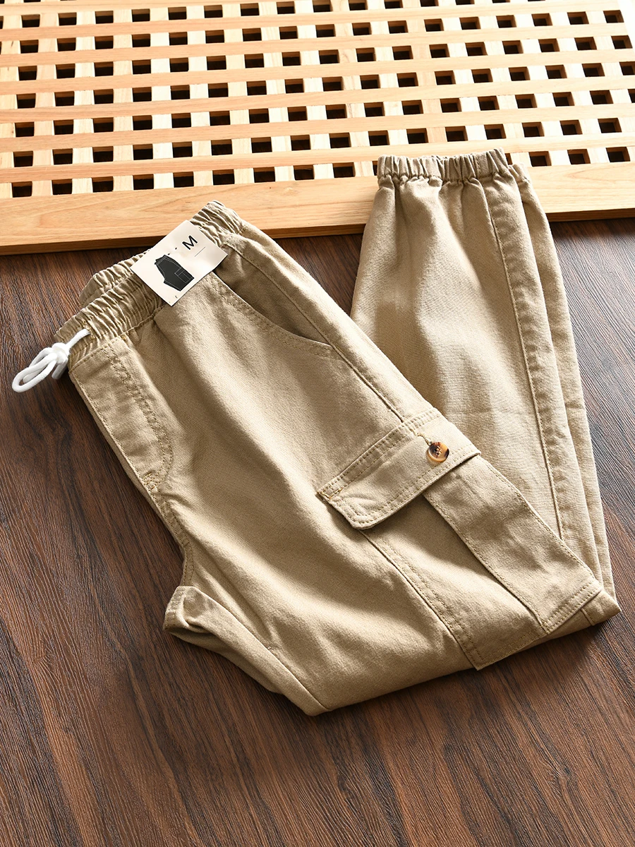 Men's Casual Cotton Pants with Multiple Pockets Workwear Style Drawstring Autumn New Fashion Urban Loose Fit Trousers
Men's Casual Cotton Pants with Multiple Pockets Workwear Style Drawstring Autumn New Fashion Urban Loose Fit Trousers