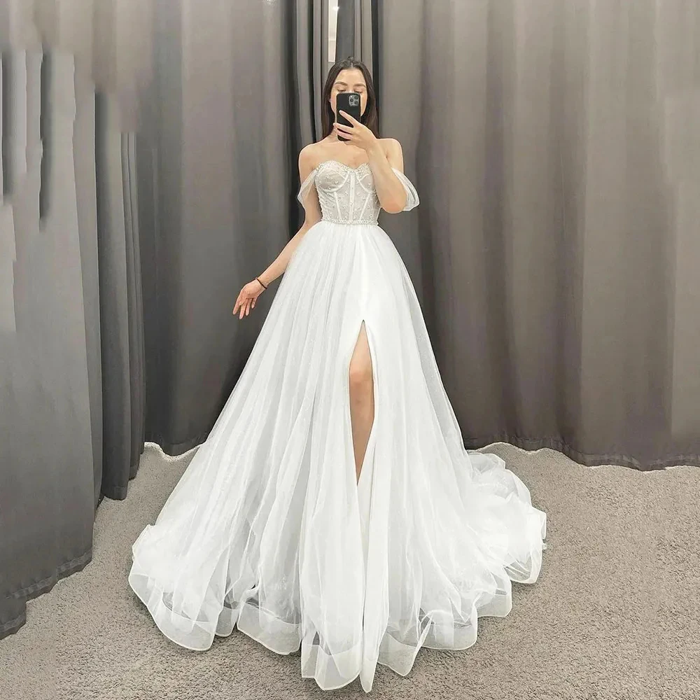 2023 Dream Wedding Dresses Beads Glitter Bride Gowns Side Split Elegant Princess Party Off The Shoulder Vestidos De Novia Robes
2023 Dream Wedding Dresses Beads Glitter Bride Gowns Side Split Elegant Princess Party Off The Shoulder Vestidos De Novia Robes