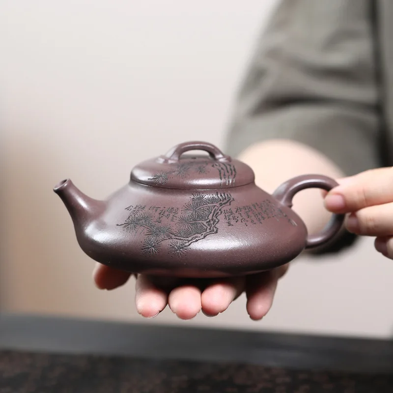 Chinese Yixing Handmade Purple Clay Teapot Raw Ore Purple Mud Tea Pot Hand-carved Tree Kettle Household Zisha Tea Set 190ml
Chinese Yixing Handmade Purple Clay Teapot Raw Ore Purple Mud Tea Pot Hand-carved Tree Kettle Household Zisha Tea Set 190ml