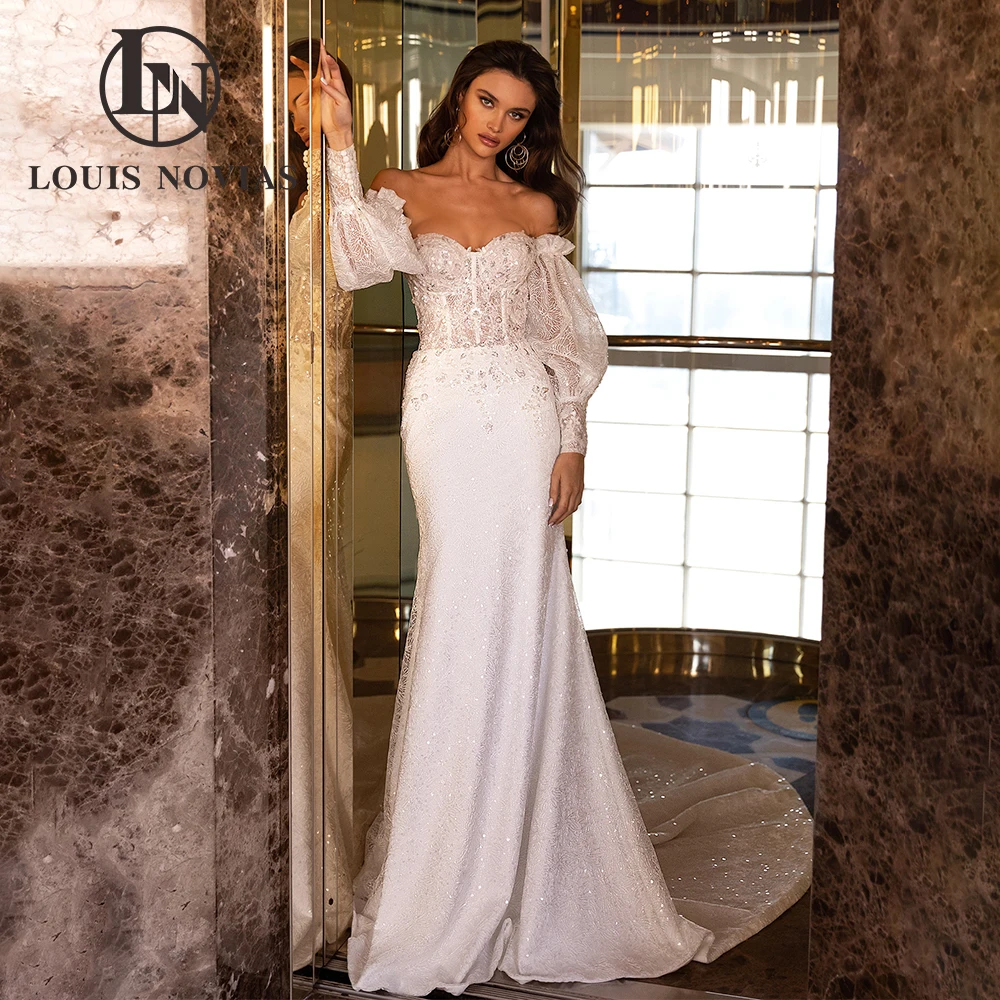 LOUIS NOVIAS Свадебные платья русалки Сексуальное свадебное платье с открытой спиной без бретелек со съемными пышными рукавами и аппликациями Vestidos De Novi
LOUIS NOVIAS Свадебные платья русалки Сексуальное свадебное платье с открытой спиной без бретелек со съемными пышными рукавами и аппликациями Vestidos De Novi