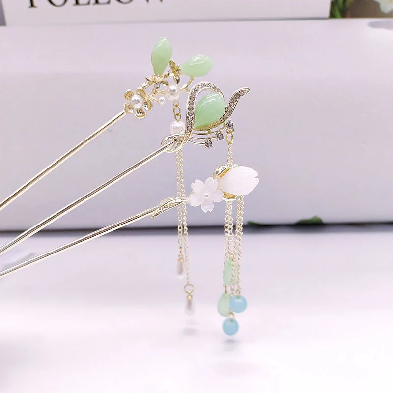 Chinese-style flower bud pearl tassel hairpin, horse face skirt accessory, women's ancient-style coiled hair hairpin
Chinese-style flower bud pearl tassel hairpin, horse face skirt accessory, women's ancient-style coiled hair hairpin