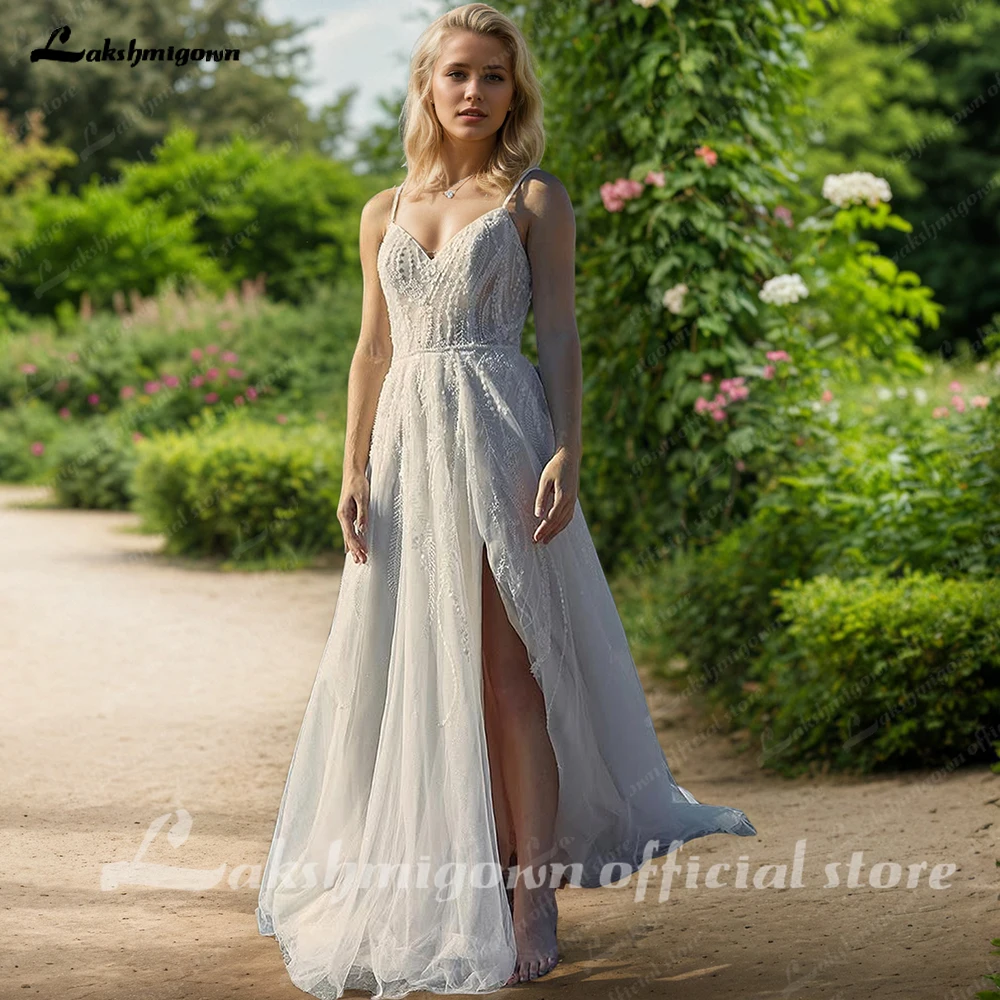 Lakshmigown Boho Кружевные аппликации Свадебные платья трапециевидной формы с разрезом по бокам и открытой спиной на бретельках Свадебное платье по индивидуальному заказу
Lakshmigown Boho Кружевные аппликации Свадебные платья трапециевидной формы с разрезом по бокам и открытой спиной на бретельках Свадебное платье по индивидуальному заказу