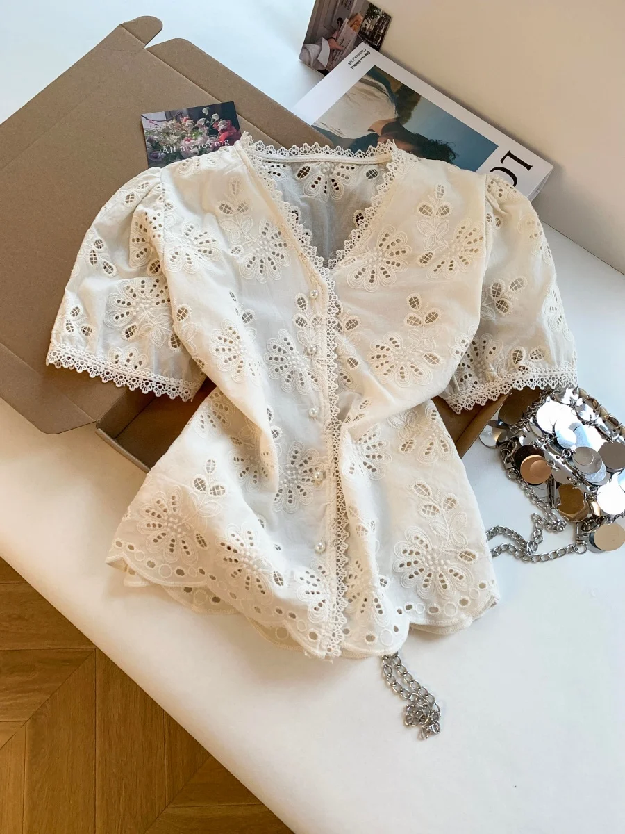 Sweet Elegant Hollow-out Crochet Embroidery Shirt for Women, Summer V-neck Short-Sleeved Loose Lace-Edged Puff Sleeve Top
Sweet Elegant Hollow-out Crochet Embroidery Shirt for Women, Summer V-neck Short-Sleeved Loose Lace-Edged Puff Sleeve Top