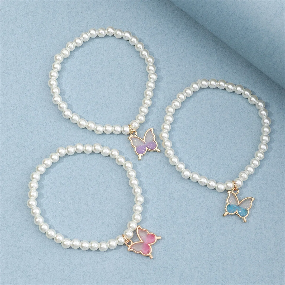 3Pcs Girls Imitation Pearl Bracelet Set with Simple Butterfly Design Elegant And Stylish Jewelry Accessories for Kids
3Pcs Girls Imitation Pearl Bracelet Set with Simple Butterfly Design Elegant And Stylish Jewelry Accessories for Kids