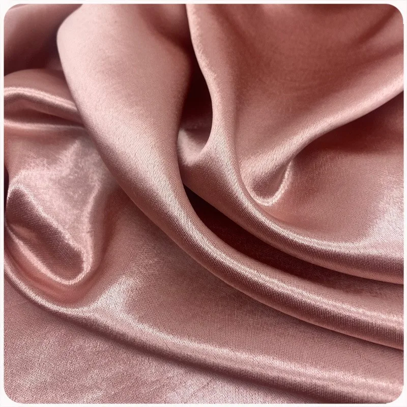 High-quality imitation acetic acid golden luan satin glossy fabric with a silky smooth and draping feel for skirt shoe materials
High-quality imitation acetic acid golden luan satin glossy fabric with a silky smooth and draping feel for skirt shoe materials