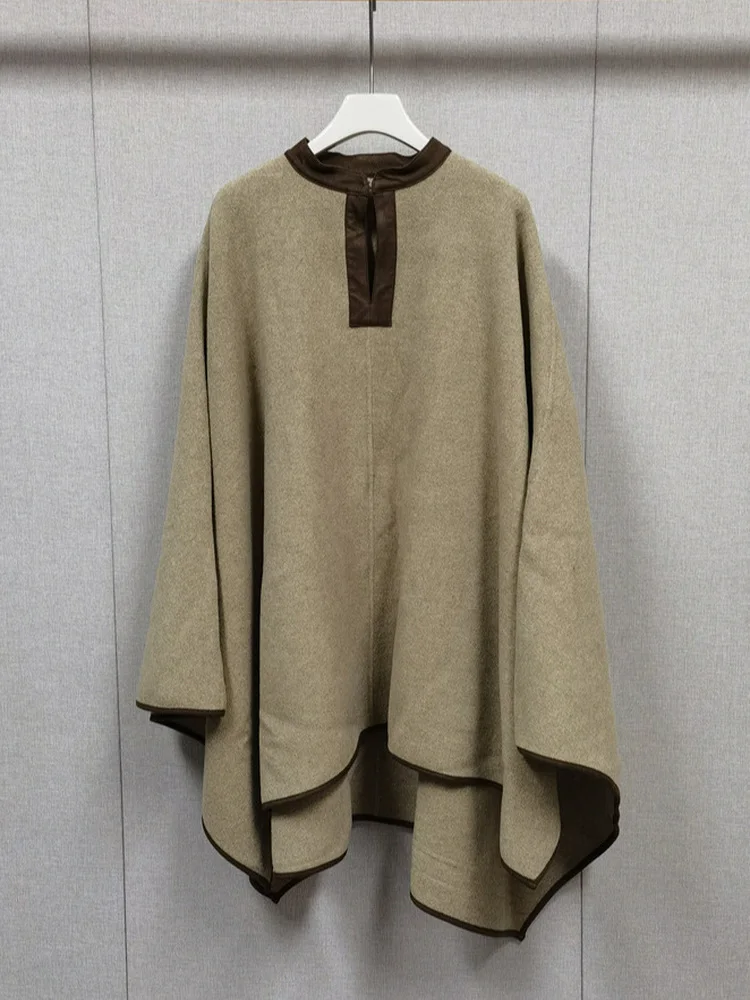 Ladies Suede Patchwork mat Silhouette Design Woolen Cloak Coat Autumn Winter Straight Cut Long Sve round Ne Coat
Ladies Suede Patchwork mat Silhouette Design Woolen Cloak Coat Autumn Winter Straight Cut Long Sve round Ne Coat