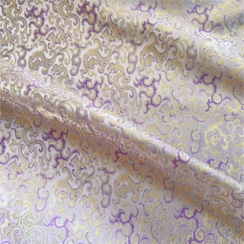 New Chinese-style women's cheongsam made of purple dragon pattern jacquard imitation brocade fabric
New Chinese-style women's cheongsam made of purple dragon pattern jacquard imitation brocade fabric
