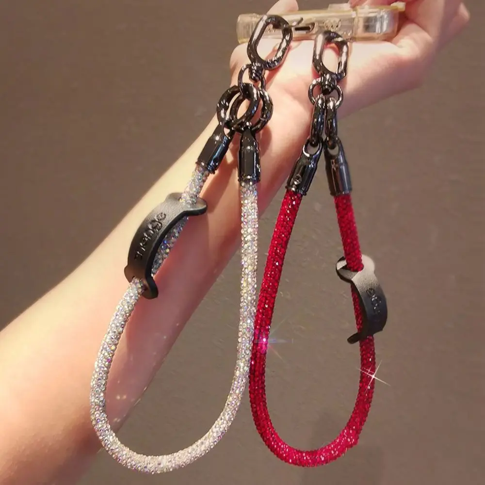 Hanging Cord Glitter Rhinestone Phone Lanyard Short Wrist Style Luxury Diamond Phone Rope Handheld Anti Loss Mobile Phone Chain
Hanging Cord Glitter Rhinestone Phone Lanyard Short Wrist Style Luxury Diamond Phone Rope Handheld Anti Loss Mobile Phone Chain