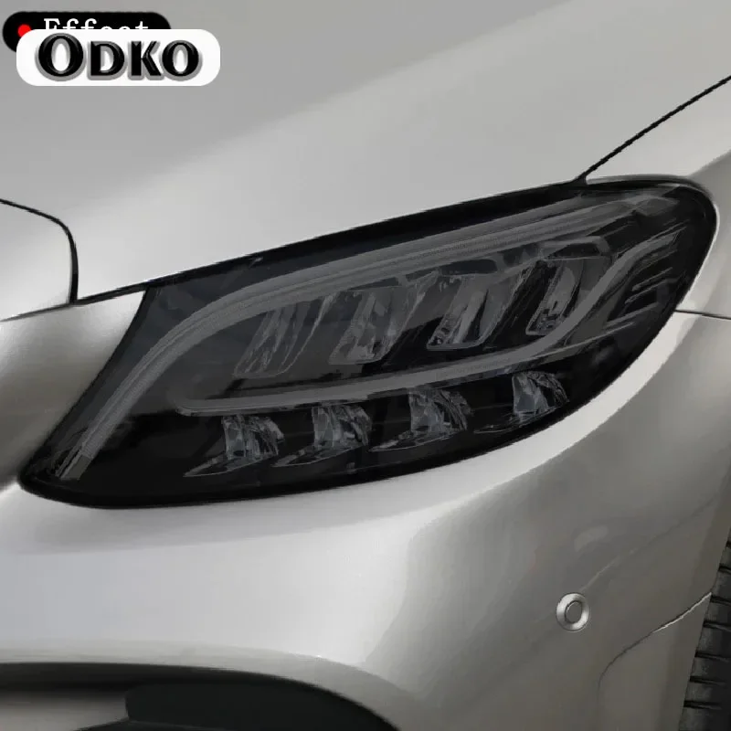 Защитная тонировочная пленка для фар автомобиля, дымчатая черная прозрачная наклейка из ТПУ для Mercedes Benz C Class W205 AMG, аксессуары
Защитная тонировочная пленка для фар автомобиля, дымчатая черная прозрачная наклейка из ТПУ для Mercedes Benz C Class W205 AMG, аксессуары