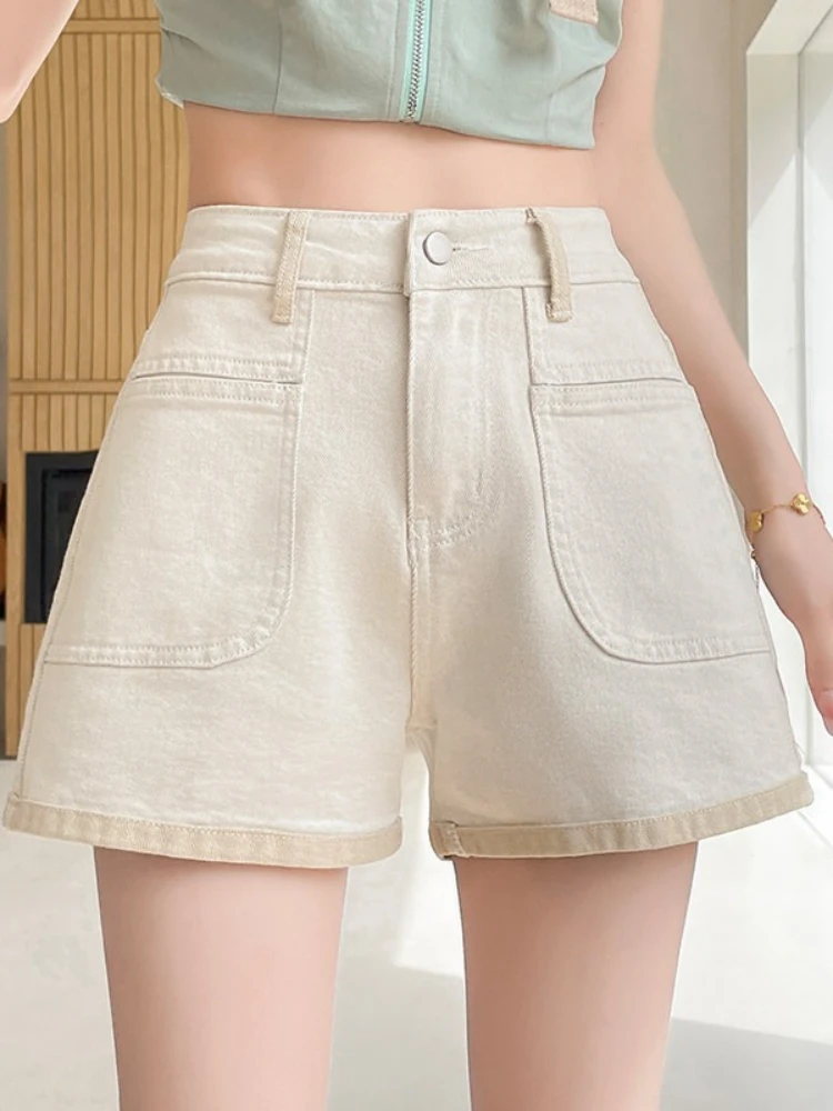 Curled denim shorts women's summer new high waisted contrasting color splicing A-line wide leg spicy girl short pants
Curled denim shorts women's summer new high waisted contrasting color splicing A-line wide leg spicy girl short pants
