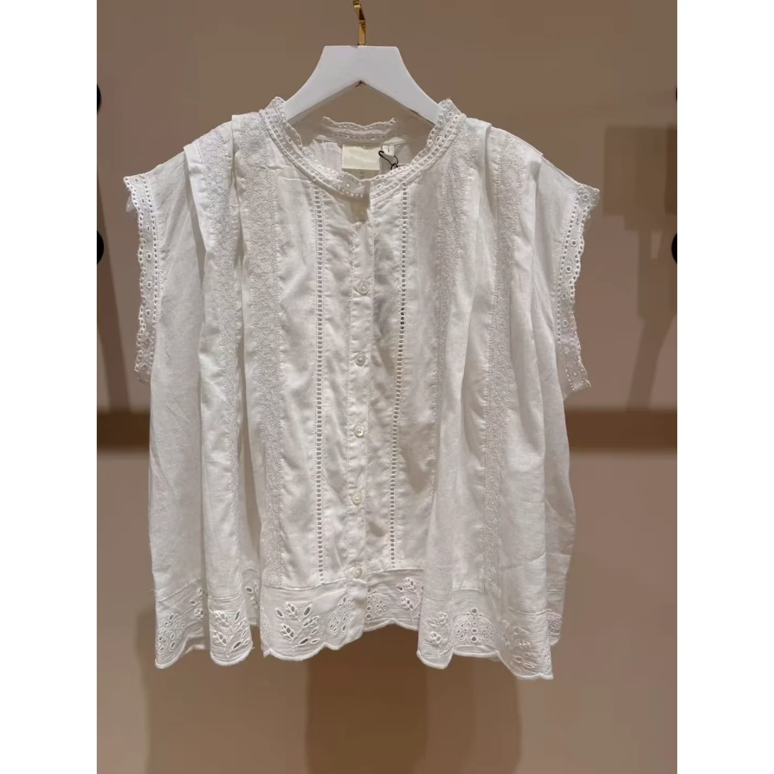 Elegant White Cotton Embroidered Floral Hollow out Sleeveless Shirt Women's Summer Breathable Loose Fit Shirt by HEIDD
Elegant White Cotton Embroidered Floral Hollow out Sleeveless Shirt Women's Summer Breathable Loose Fit Shirt by HEIDD