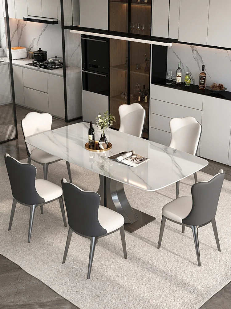 A combination of Italian rectangular dining tables and chairs for small households with a rock board dining table
A combination of Italian rectangular dining tables and chairs for small households with a rock board dining table