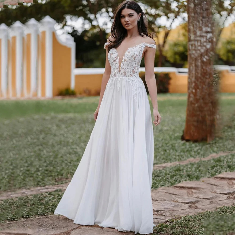 Classic Off the Shoulder Short Sleeve Wedding Dress Applique A-Line Chiffon Floor Length Elegant Backless Bridal Gowns Robe
Classic Off the Shoulder Short Sleeve Wedding Dress Applique A-Line Chiffon Floor Length Elegant Backless Bridal Gowns Robe