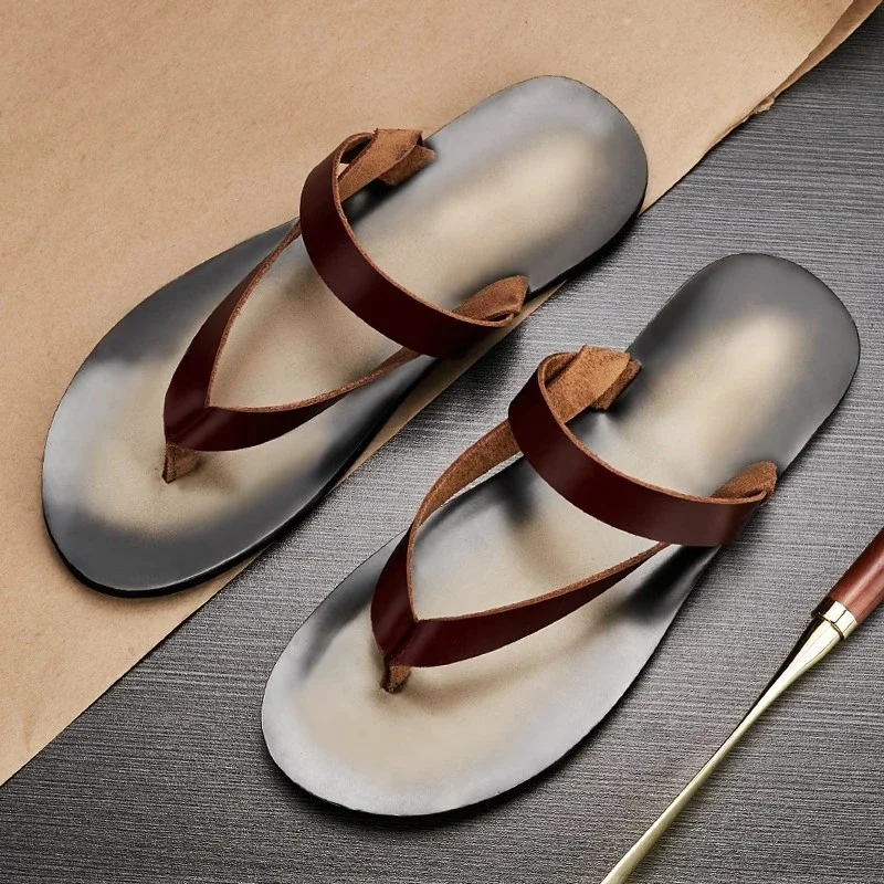 Роскошные мужские шлепанцы из натуральной кожи, модная уличная пляжная обувь на плоской подошве, качественные удобные летние тапочки ручной работы 2026, мужские
Роскошные мужские шлепанцы из натуральной кожи, модная уличная пляжная обувь на плоской подошве, качественные удобные летние тапочки ручной работы 2026, мужские