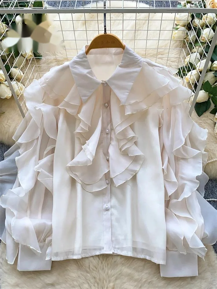 Уличная блузка с французскими оборками, женская шифоновая верхняя одежда с лацканами и длинными рукавами для отпуска, однотонная свободная рубашка для рабочей одежды
Уличная блузка с французскими оборками, женская шифоновая верхняя одежда с лацканами и длинными рукавами для отпуска, однотонная свободная рубашка для рабочей одежды