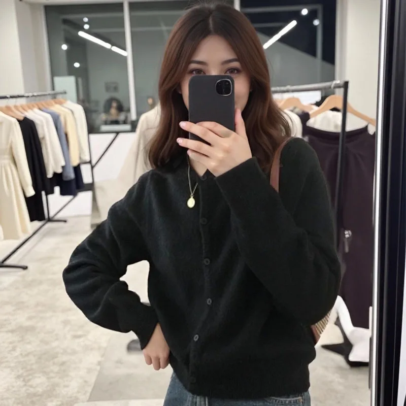 Round neck black knitted temperament short cardigan, loose outer sweater jacket for autumn and winter commuting women
Round neck black knitted temperament short cardigan, loose outer sweater jacket for autumn and winter commuting women
