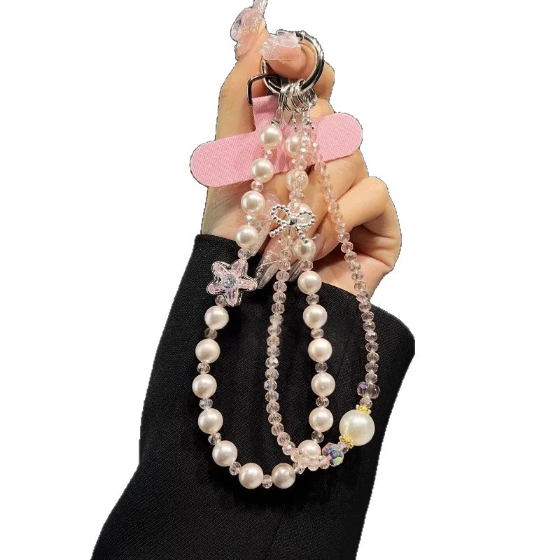 High-End Fashion Pearl Mobile Phone Chain Star Beaded Double Crystal Lanyard Short Wrist Hand-Held Hanging Accessory
High-End Fashion Pearl Mobile Phone Chain Star Beaded Double Crystal Lanyard Short Wrist Hand-Held Hanging Accessory