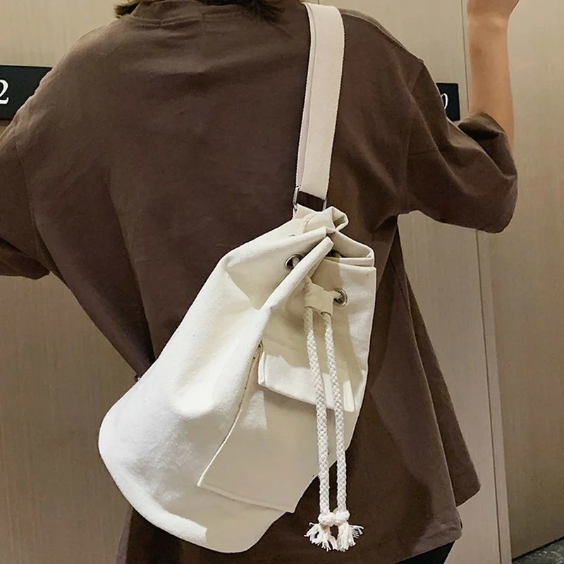 Simple Canvas Drawstring Bucket Bag, Solid Color Fashion Travel Casual Sling Bag For Daily Use
Simple Canvas Drawstring Bucket Bag, Solid Color Fashion Travel Casual Sling Bag For Daily Use