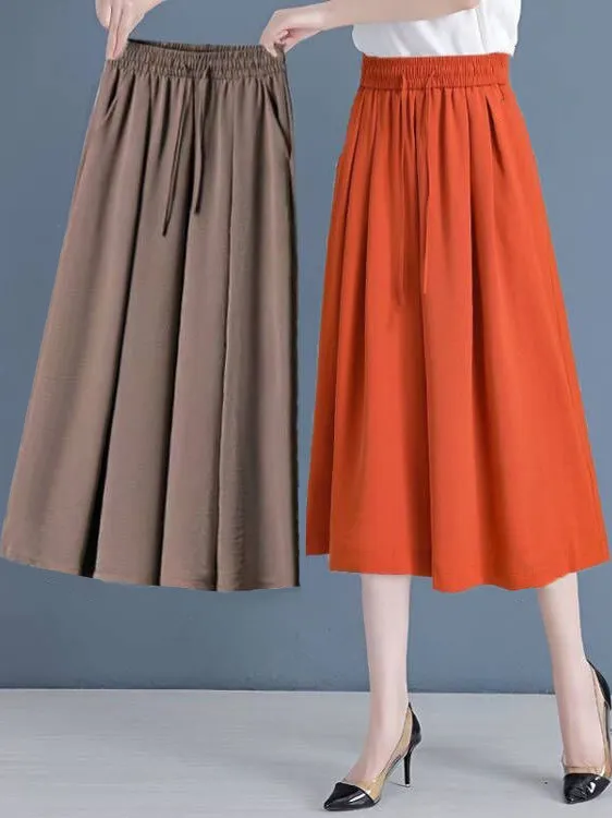 New 2025 Women's Skirt Pants Seven-Foot Ice Silk Loose Thin Summer Trousers High Waist Wide Leg Pants Casual Commute Style
New 2025 Women's Skirt Pants Seven-Foot Ice Silk Loose Thin Summer Trousers High Waist Wide Leg Pants Casual Commute Style