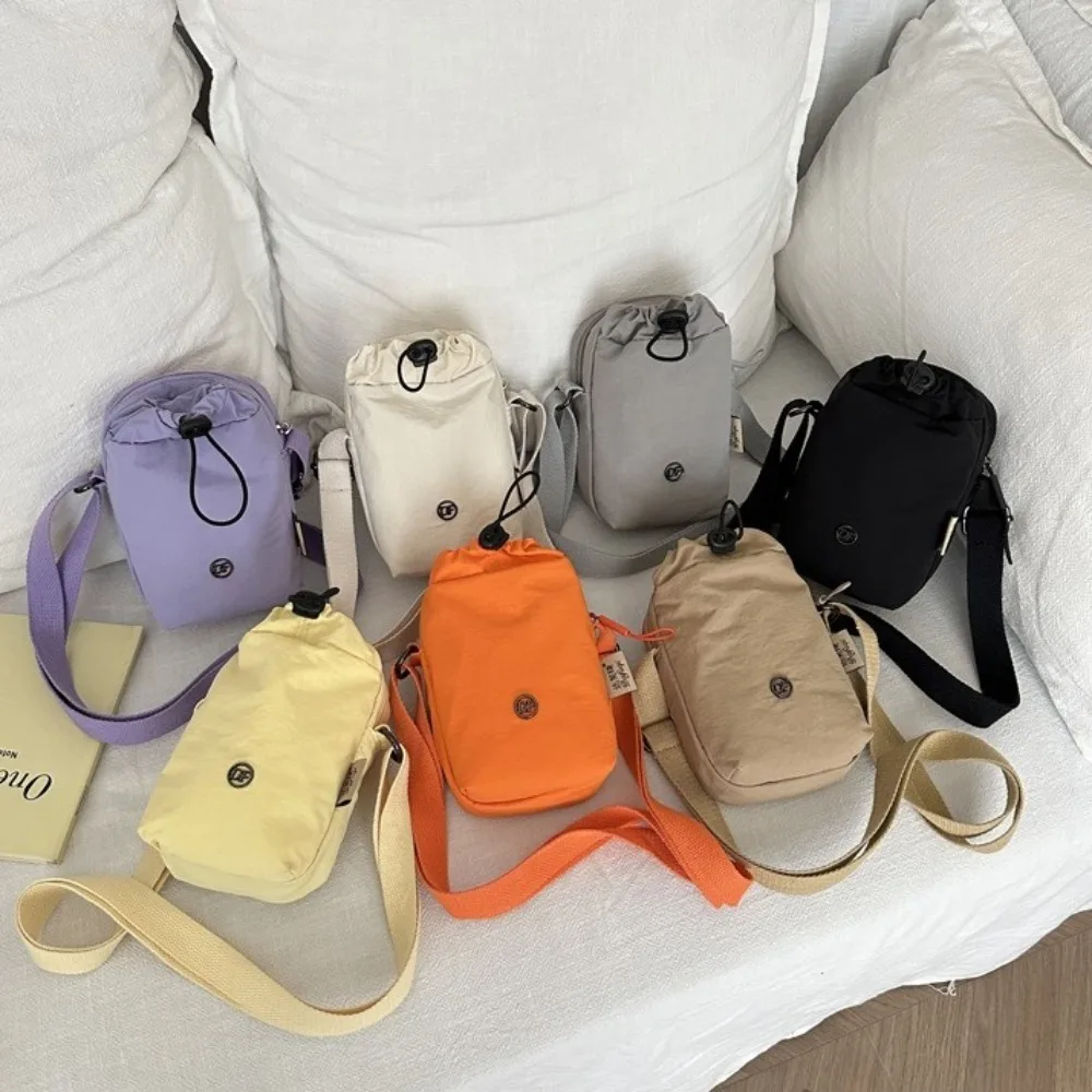 Solid Color Mini Nylon Crossbody Bag Multifunctional Zipper Drawstring Small Square Bag Ultra-light Storage Bag
Solid Color Mini Nylon Crossbody Bag Multifunctional Zipper Drawstring Small Square Bag Ultra-light Storage Bag