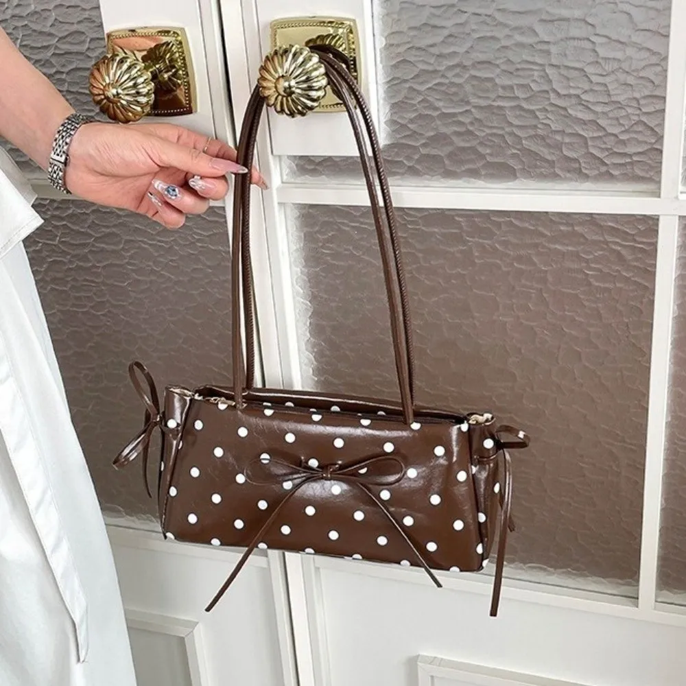 Elegant Polka Dot Underarm Bag Glossy Finish Minimalist Design PU Bow Shoulder Bag Long Shoulder Strap Slim Rectangular Handbag
Elegant Polka Dot Underarm Bag Glossy Finish Minimalist Design PU Bow Shoulder Bag Long Shoulder Strap Slim Rectangular Handbag