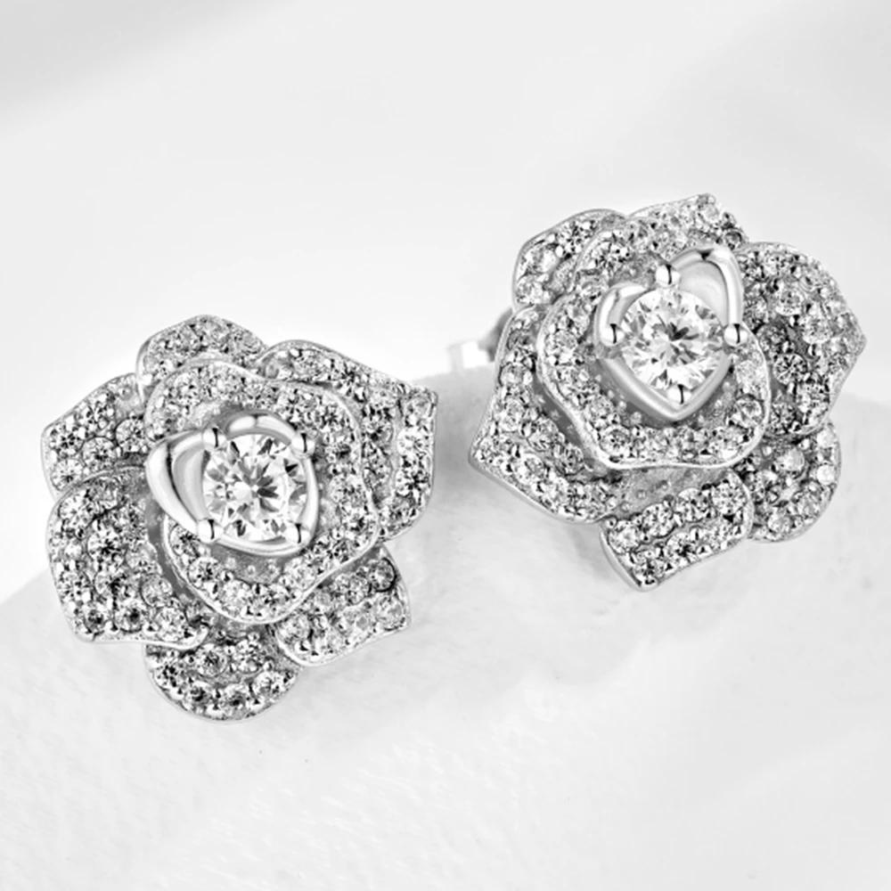 Настоящее серебро S925, серьги с цветком, сверкающие серьги с камелией, женские роскошные ювелирные изделия, блестящий циркон 5А, подарок для вечеринки, банкета
Настоящее серебро S925, серьги с цветком, сверкающие серьги с камелией, женские роскошные ювелирные изделия, блестящий циркон 5А, подарок для вечеринки, банкета
