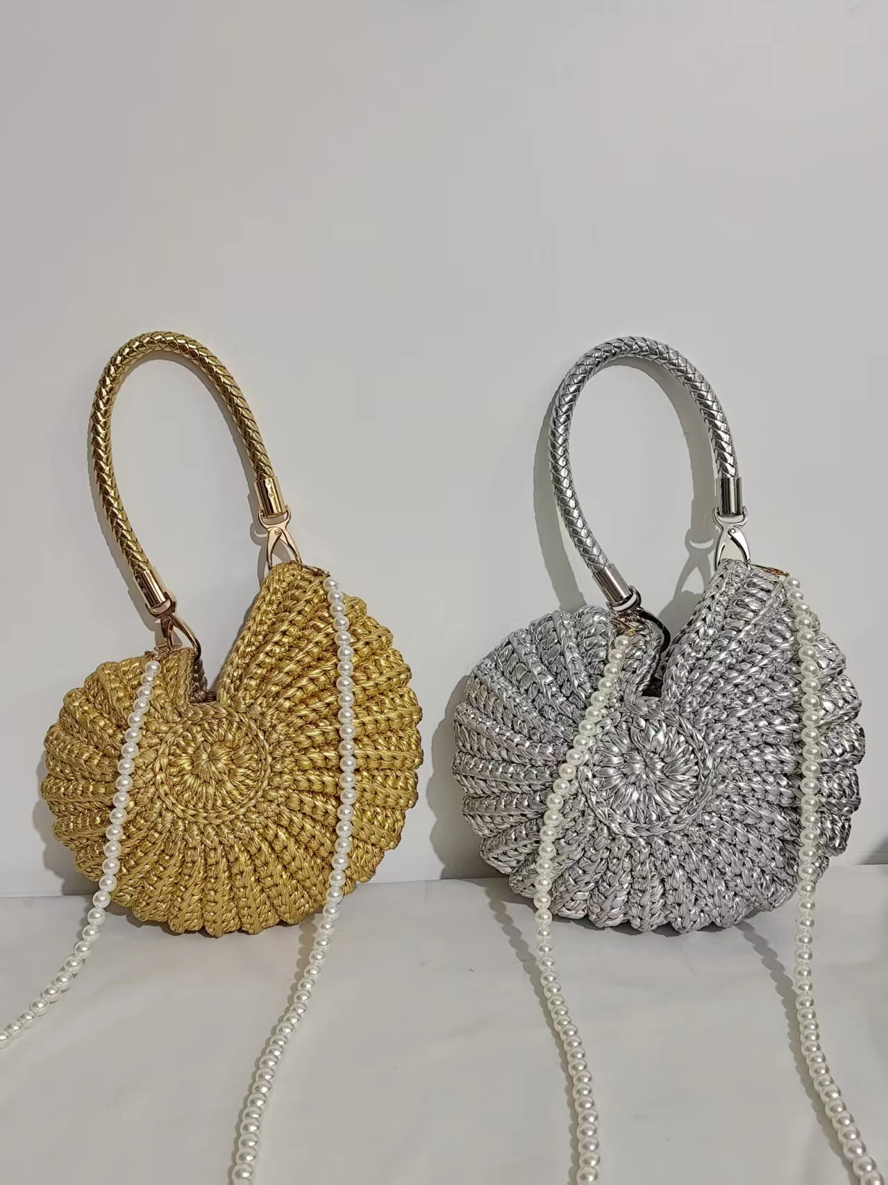 Hand-woven Metallic Textured Shell Bag with Pearl Chain, Convertible Top Handle & Crossbody Bag for Women
Hand-woven Metallic Textured Shell Bag with Pearl Chain, Convertible Top Handle & Crossbody Bag for Women