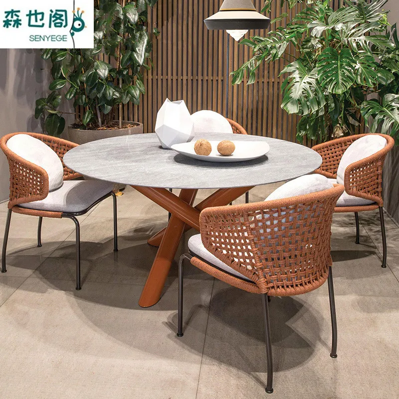 Nordic outdoor rattan tables and chairs courtyard terrace homestay with waterproof rattan chairs leisure dining table
Nordic outdoor rattan tables and chairs courtyard terrace homestay with waterproof rattan chairs leisure dining table