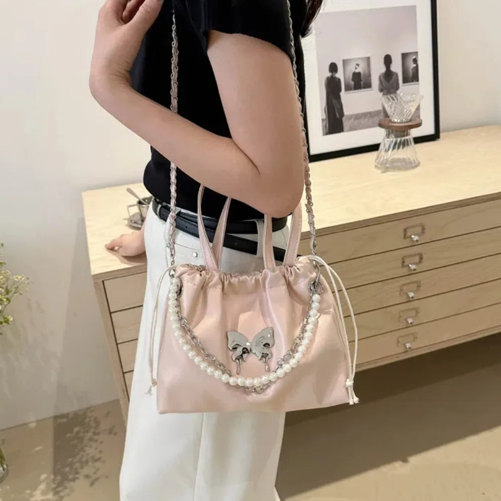 Magnetic Buckle Drawstring PU Backpack Butterfly Decor Metal Chain Drawstring Shoulder Bag Beaded Decor Korean Style
Magnetic Buckle Drawstring PU Backpack Butterfly Decor Metal Chain Drawstring Shoulder Bag Beaded Decor Korean Style